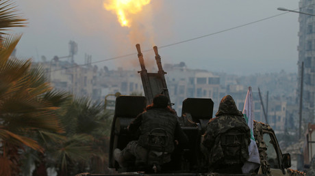 Free Syrian Army fighters fire an anti-aircraft weapon in a rebel-held area of Aleppo  © Abdalrhman Ismail 