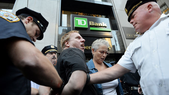A man is arrested during the Occupy Wall Street protest September 17, 2012 on the one year anniversary of the movement in New York.(AFP Photo / Stan Honda)