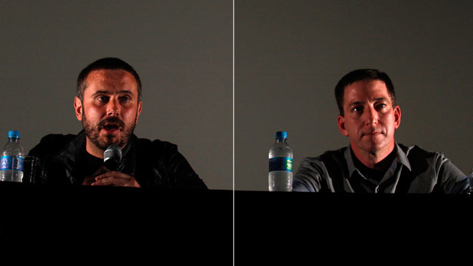 US journalists Jeremy Scahill (L) and Glenn Greenwald. (Reuters / Pilar Olivares)