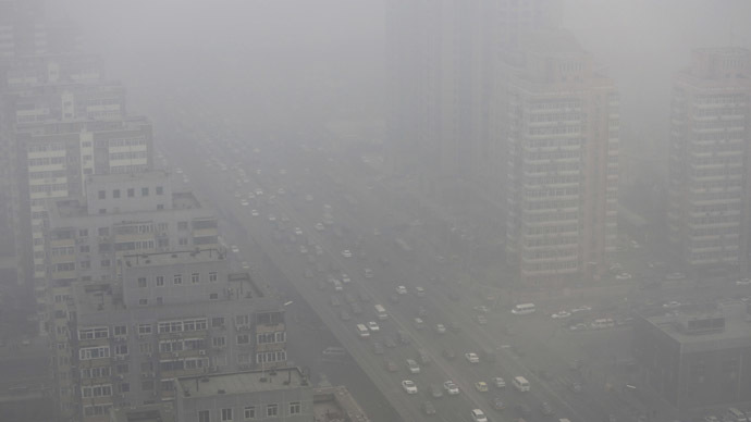 Cars drive on the Three Ring Road amid the heavy haze in Beijing (Reuters/Jason Lee)