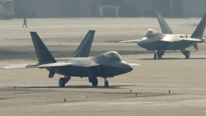F-22 stealth fighter jets belonging to the U.S. Air Force move to take off at a U.S. air force base in Osan, south of Seoul April 3, 2013. (Reuters/Lee Jae-Won)