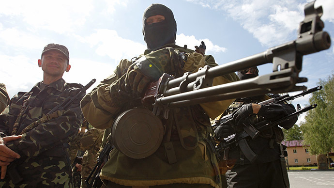Members of the "Donbass" self-defence battalion attend a ceremony to swear the oath to be officially included into the reserve battalion of the National Guard of Ukraine near Kiev June 23, 2014. (Reuters/Valentyn Ogirenko)