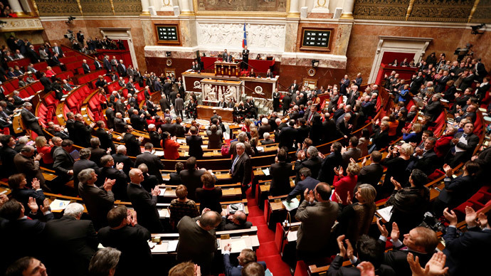 General view of the hemicycle as deputies applaud after the results of the vote on Palestine status at the National Assembly in Paris December 2, 2014. (Reuters / Charles Platiau)