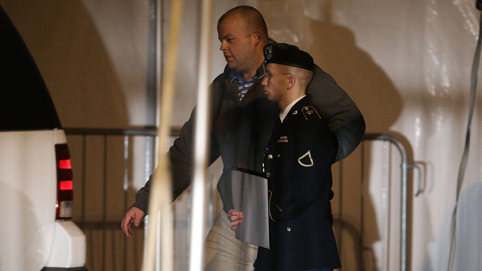 Pfc. Bradley E. Manning is escorted from a hearing, on February 28, 2013 in Fort Meade, Maryland (Mark Wilson / Getty Images / AFP)