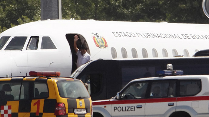 Bolivian President Evo Morales waves from his plane before leaving the Vienna International Airport in Schwechat July 3, 2013. (Reuters/Heinz-Peter Bader)