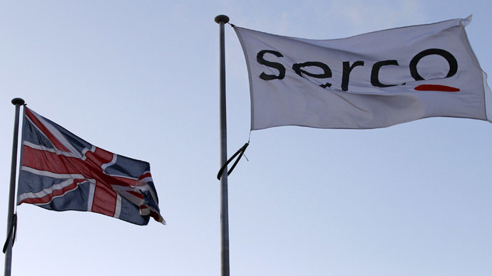 A Serco flag is seen flying alongside a Union flag outside Doncaster Prison in northern England (Reuters/Darren Staples)