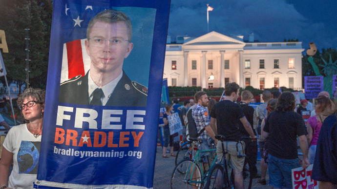 Protesters from a coalition of groups demonstrate the conviction of Wikileaker Bradley Manning late August 21, 2013 in front of the White House in Washington, DC. (AFP Photo/Paul J. Richards)