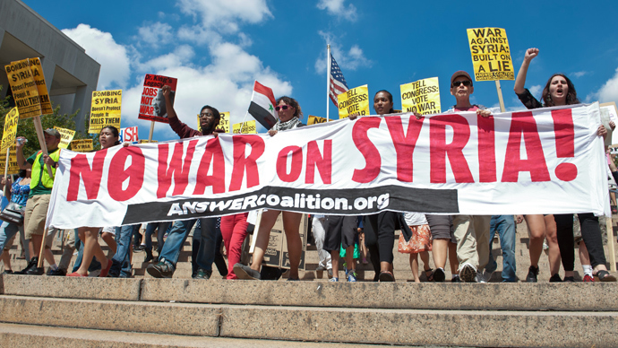 People march from the White House to the US Capitol in Washington against US intervention in Syria on September 7, 2013 (AFP Photo / Nicholas Kamm)