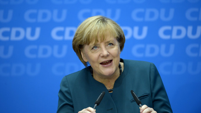 German Chancellor and candidate for the Christian Democratic Union (CDU) Angela Merkel speaks during a press conference in Berlin, Germany on September 23, 2013 a day after the German general elections. (AFP Photo)
