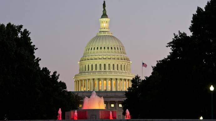 The U.S. Capitol is seen at night on the eve of a potential federal government shutdown, in Washington (Reuters)