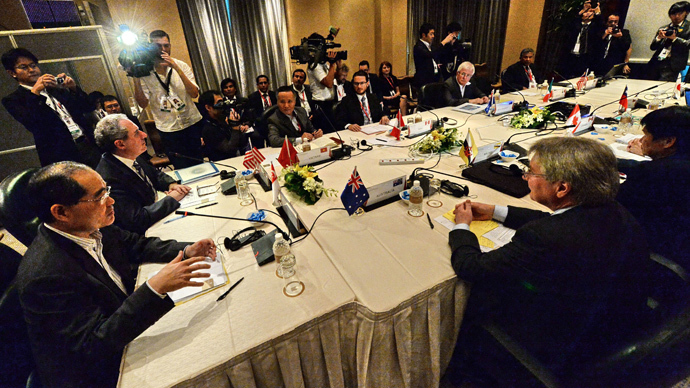 Trade ministers and representatives attend the Trans-Pacific Partnership (TPP) Ministerial Meeting in Singapore on December 7, 2013
(AFP Photo / Roslan Rahman)