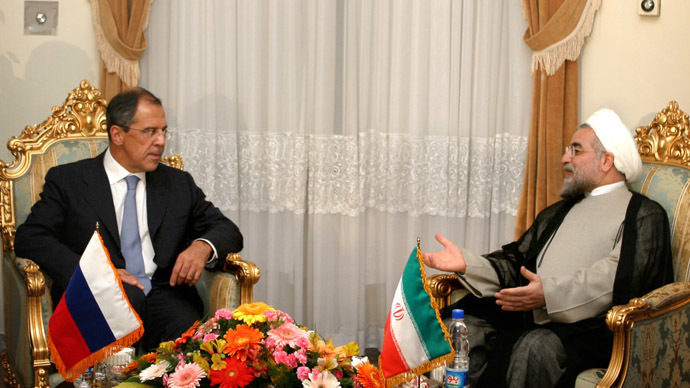 Hassan Rouhani (R) and Russian Foreign Minister Sergei Lavrov (Reuters/Morteza Nikoubazl)