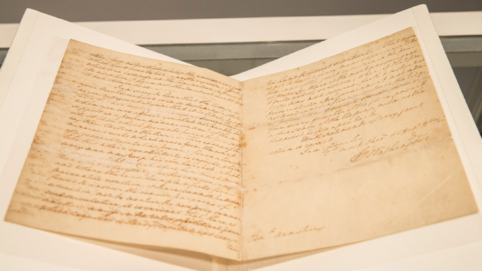 A letter regarding the United States' constitution, written by the first president of the United States, George Washington (AFP Photo / Andrew Burton)