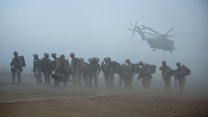 (FILE) US Marines from the 2nd Battalion, 8th Marine Regiment of the 2nd Marine Expeditionary Brigade wait for helicopter transport as part of Operation Khanjar at Camp Dwyer in Helmand Province in Afghanistan (AFP Photo / Manpreet Romana)