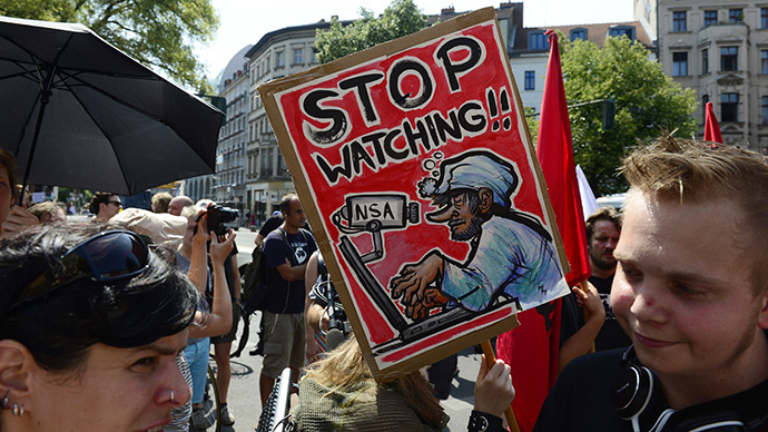 Demonstrators take part in a protest against the US National Security Agency (NSA) collecting German emails, online chats and phone calls and sharing some of it with the country's intelligence services in Berlin (AFP Photo / John Macdougall)