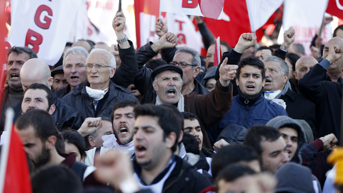 Protesters shout slogans as they try to march towards Turkish Parliament during a protest against Turkey's ruling Ak Party (AKP) and Prime Minister Tayyip Erdogan in Ankara February 13, 2014 (Reuters/Umit Bektas)