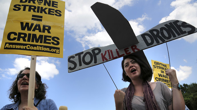 Protesters against drone strikes gather in an attempt to deliver a letter to U.S. Central Intelligence Agency (CIA) Director John Brennan as they gather outside CIA headquarters in Langley, Virginia, June 29, 2013. (Reuters/Jonathan Ernst)