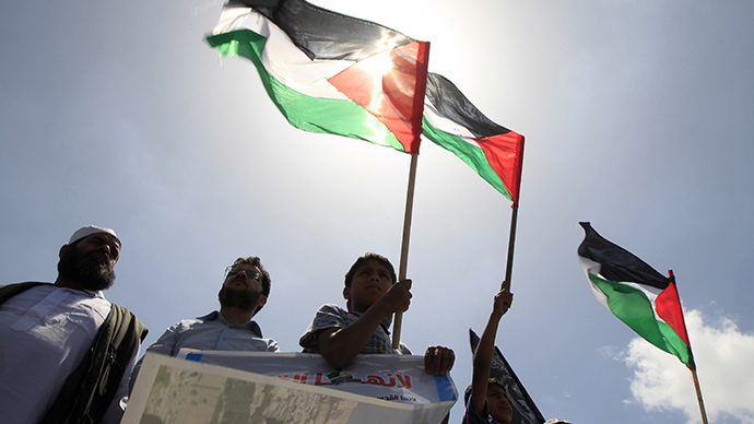 FILE PHOTO. Palestinians take part in a demonstration in Gaza city. (AFP Photo / Said Khatib)