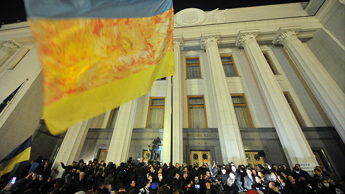 Supporters of the right wing party Pravyi Sector (Right Sector) protest in front of the Ukrainian parliament in Kiev on March 27, 2014. (AFP Photo / Genya Savilov)