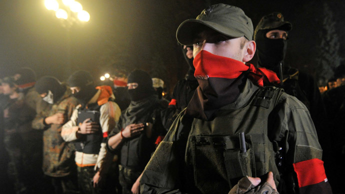 Supporters of the right wing party Pravyi Sector (Right Sector) protest in front of Ukrainian parliament in Kiev on March 27, 2014. (AFP Photo/Genya Savilov)