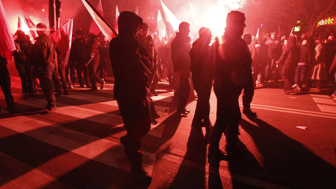 Far-right protesters walk during the annual far-right march, which coincides with Poland's National Independence Day in Warsaw (Reuters / Kacper Pempel)