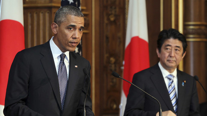 U.S. President Barack Obama (L) attends a news conference with Japanese Prime Minister Shinzo Abe (R) at the Akasaka guesthouse in Tokyo April 24, 2014. (Reuters/Junko Kimura-Matsumoto)