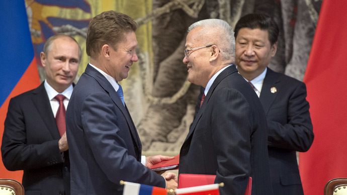 May 21, 2014. From left: President Vladimir Putin, Gazprom CEO Alexei Miller and CNPC Chairman Zhou Jiping during the signing of joint agreements in Shanghai. (RIA Novosti/Sergey Guneev)