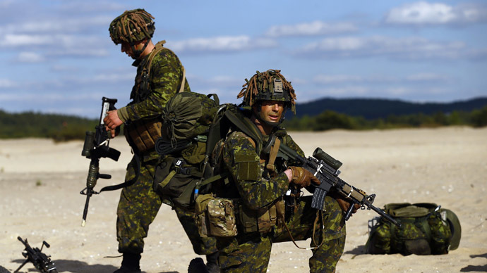 Troops from Canada's 3rd Division, composed with a platoon of 3rd Battalion and Princess Patricia's Light Infantry, participate at a NATO-led exercise "Orzel Alert" held together with the U.S. Army's 173rd Infantry Brigade Combat Team and Poland's 6th Airborne Brigade in Bledowska Desert in Chechlo, near Olkusz, south Poland May 5, 2014. (Reuters)