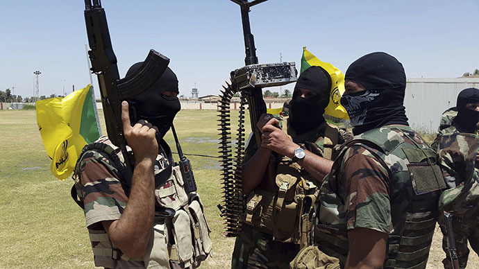 Shi'ite fighters take part in an intensive security deployment with the Iraqi army in Diyala province, 40 km (25 miles) north of Baghdad, June 16, 2014. (Reuters)