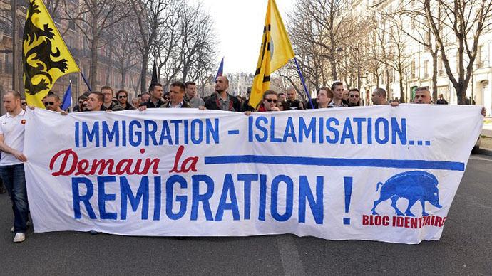 Some two hundreds people demonstrate in the streets of Paris against the government immigration policy on March 9, 2014 in Paris. (AFP Photo / Miguel Medina)