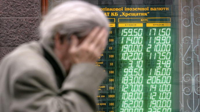 A man walks past a currency exchange office in Kiev (Reuters)