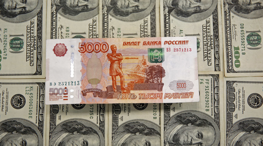 Russian ruble hits 60 against US dollar, close to erasing 2015 gains