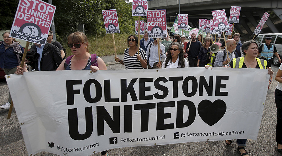 Police use force to separate pro and anti-migrant rallies at British Eurotunnel terminal