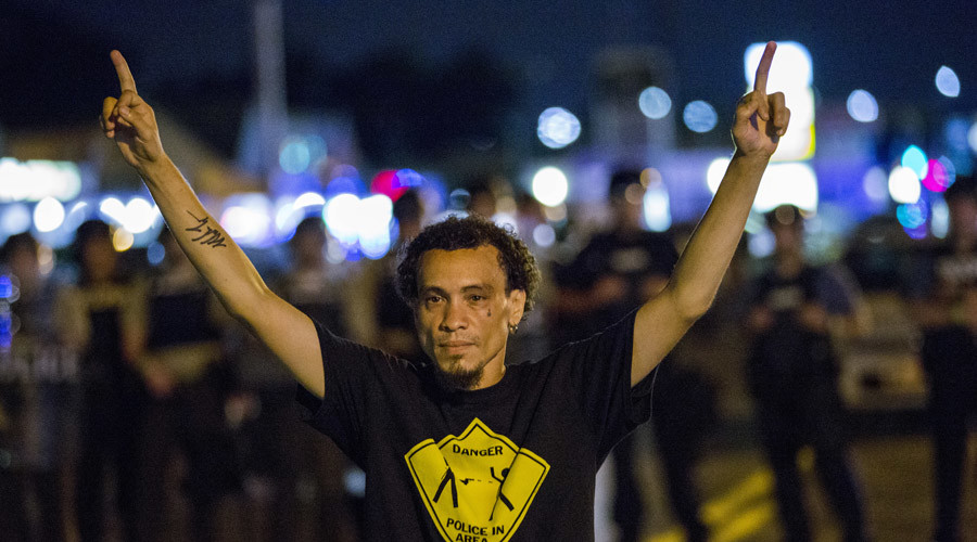 Ferguson police ‘are inflaming tensions by declaring state of emergency’