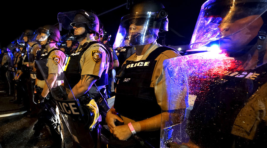 Picture of student shielding cops in Ferguson goes viral, becomes meme, leads to death threats