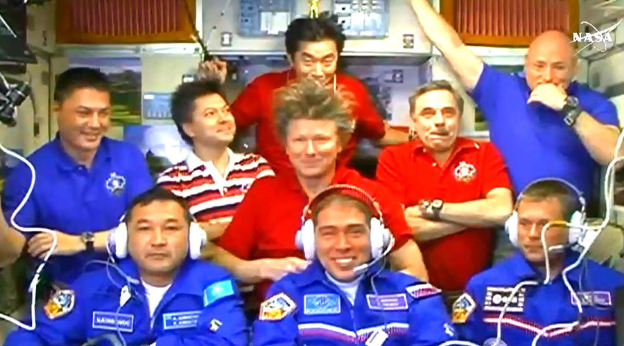 Soyuz capsule docks with International Space Station, raises crew to 9