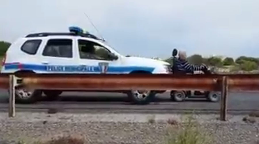 Need a push? French policemen criticized after scooting disabled man home with patrol car