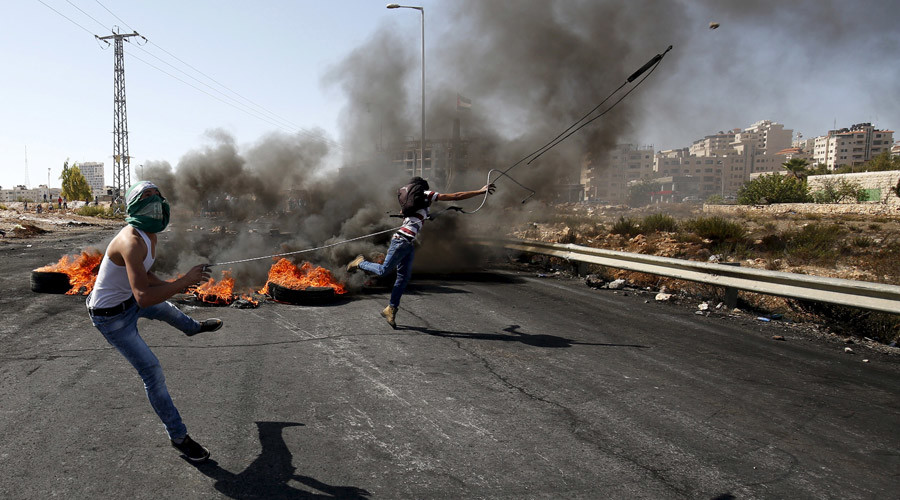 Palestinian shot dead by police after stabbing Israeli soldier in attempt to seize his gun
