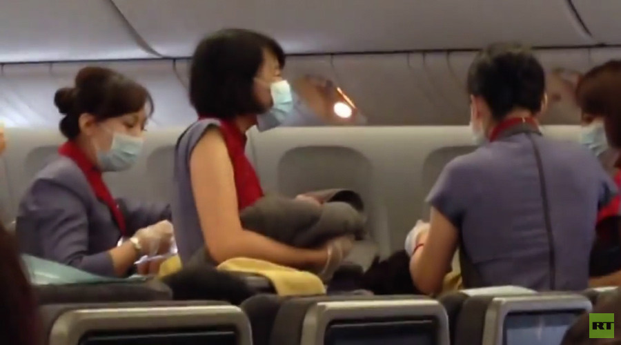 Baby on board! Woman gives birth at 9,000 meters above Earth on flight to LA