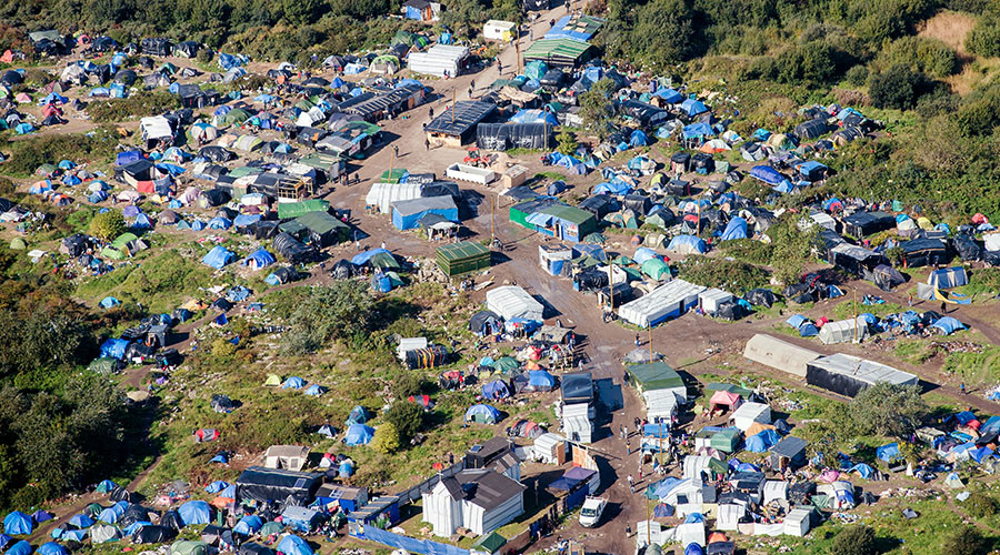 ‘New Jungle’ grows: Shocking images show migrant camp in French port city, mayor calls on army