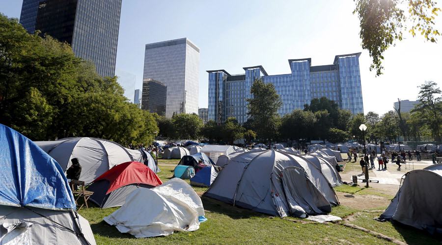 Belgian interior minister under fire for proposing refugees wear identity badges