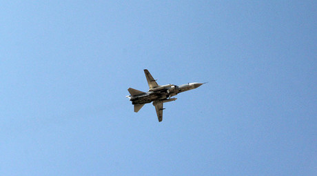 A Russian Su-24 strike aircraft in the sky over the Khmeimim airbase in Syria. © Dmitriy Vinogradov