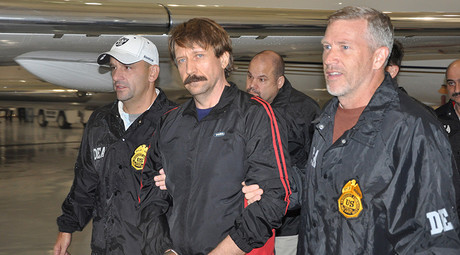 FILE PHOTO: Suspected Russian arms dealer Viktor Bout (C) is escorted by Drug Enforcement Administration (DEA) officers after arriving at Westchester County Airport in White Plains, New York November 16, 2010. © US Department of Justice