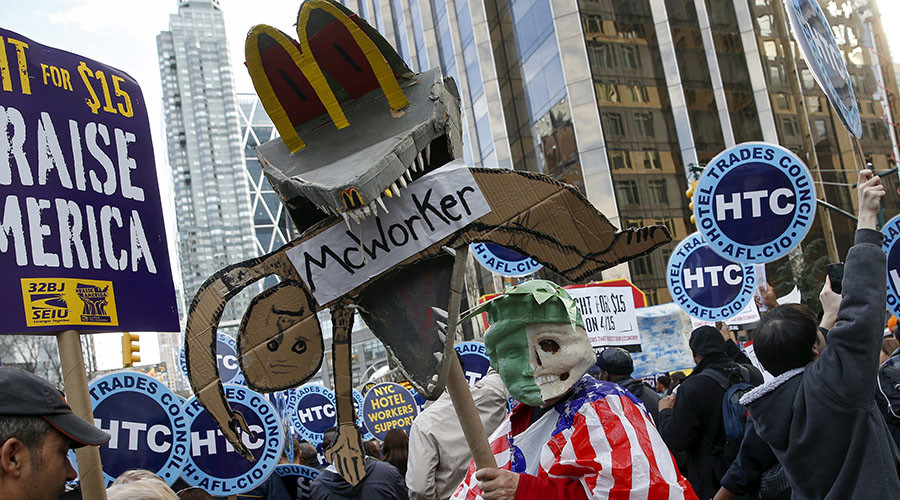 Demonstrators rally during demonstrations asking for higher wages in the Manhattan borough of New York April 15, 2015. © Shannon Stapleton