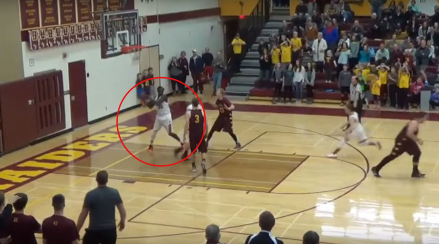 VIDEO: Teen basketball player makes ‘one in a million shot’