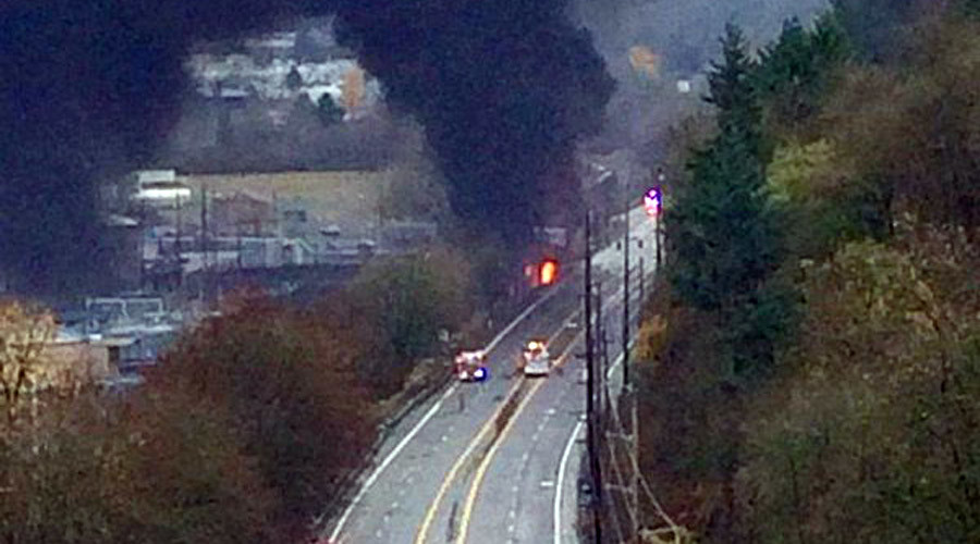 Truck crashes into train causing massive fire in Oregon (PHOTOS)
