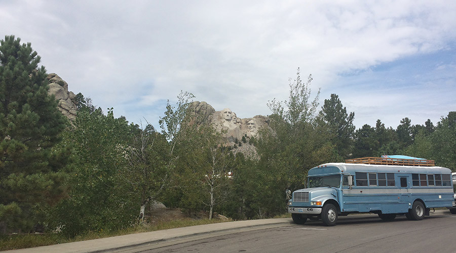 Unemployed man ‘living the dream’ in converted school bus (PHOTOS)