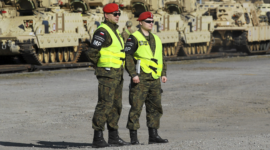 Poland sends troops to enforce ‘dismissal’ of NATO intel center head