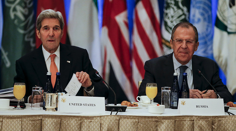 U.S. Secretary of State John Kerry (L) and Foreign Minister of Russia Sergey Lavrov are seen seated next to each other before a meeting of Foreign Ministers about the situation in Syria at the Palace Hotel in the Manhattan borough of New York December 18, 2015. © Carlo Allegri