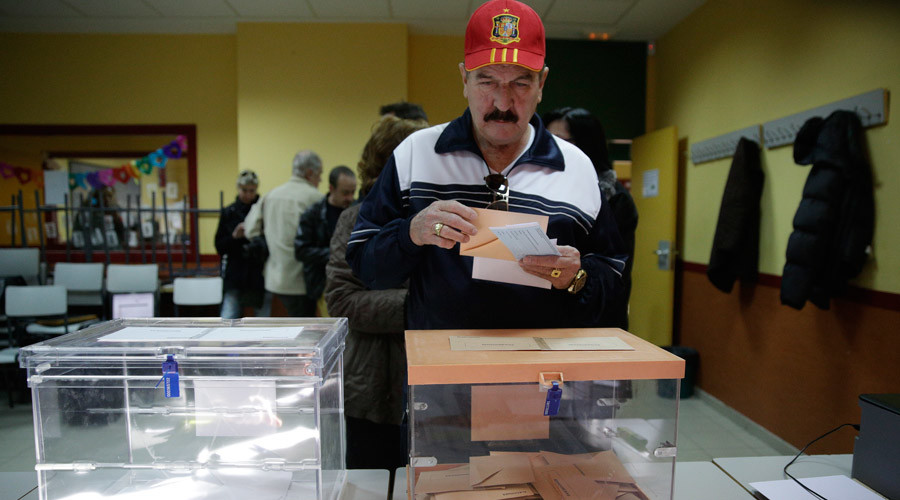 Spain's conservatives face tough challenge from fresh anti-austerity parties as Spaniards vote